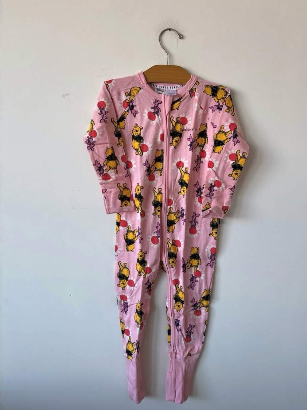 Bonds Pink Winnie the Pooh Print Footed Onesie